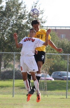 UHV's Isreal Zamora battles a St. Thomas defender for the ball Thursday in the Jaguars' 2-0 win.